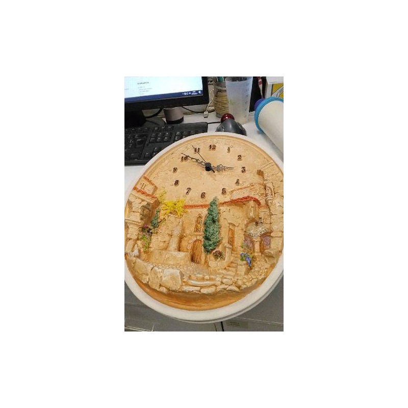HORLOGE MURALE OVALE 