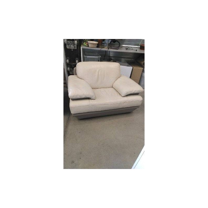 FAUTEUIL CUIR BICOLORE EN LETAT  (USURES DERRIERE)  